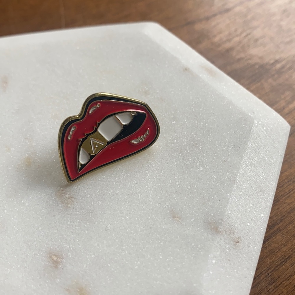 Aveda pin